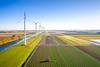 Windmills in fields in the netherlands