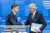 Valdis Dombrovskis and Romanian Minister for Public Finance after ECOFIN press conference