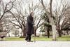 old man walking with stick in park