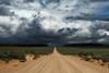 dirt road horizon storm