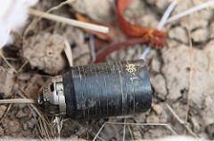 Photograph of an unexploded M85 type cluster submunition, courtesy of the Cluster Munition Coalition