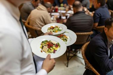 waiter serving food restaurant