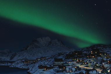 the aurora borealis covers the night sky of greenlands capital nuuk