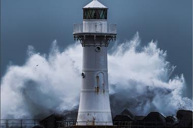 lighthouse storm sea