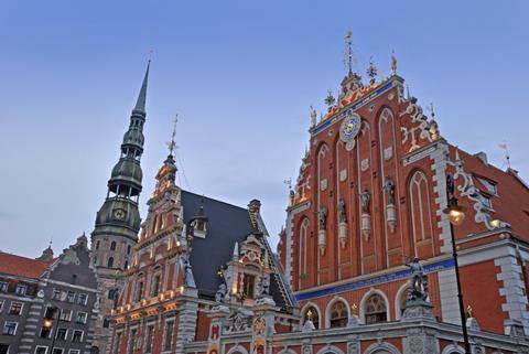 Facade and environment of St Peter's church in Riga Latvia