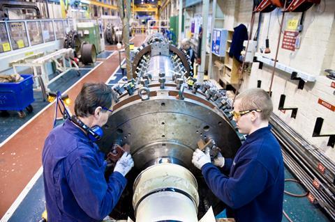 Engineers working on a generator for Brush, a Melrose-owned company