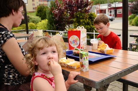 family having lunch in mcdonalds